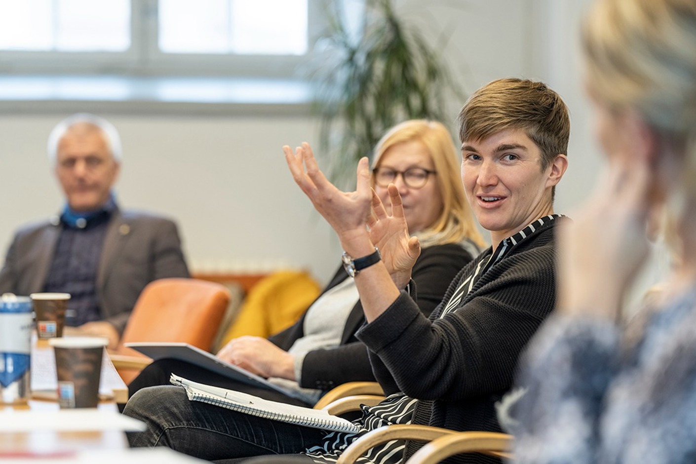 Fyra personer i en workshopsituation.